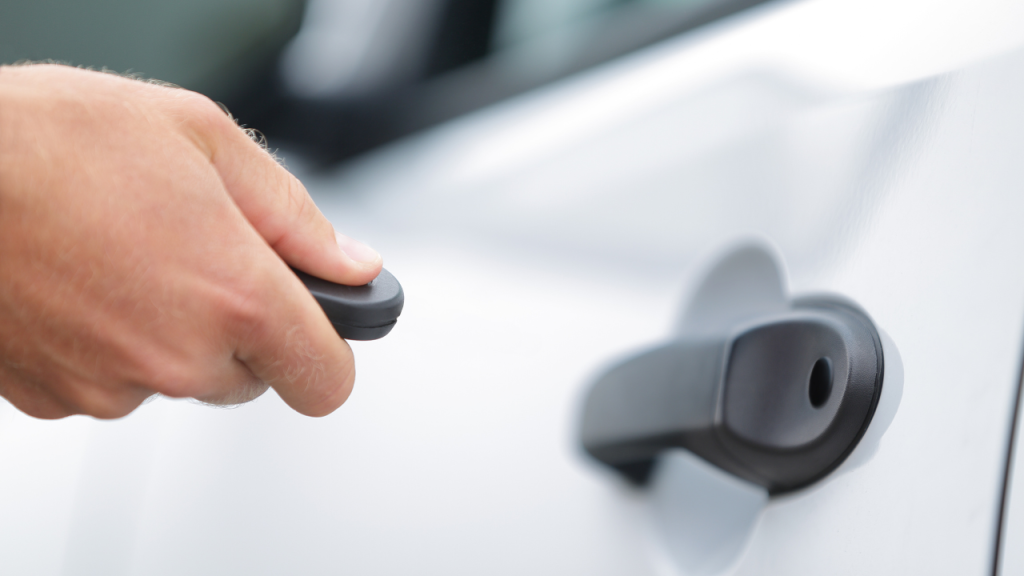 man-using-keyfob-to-open-car